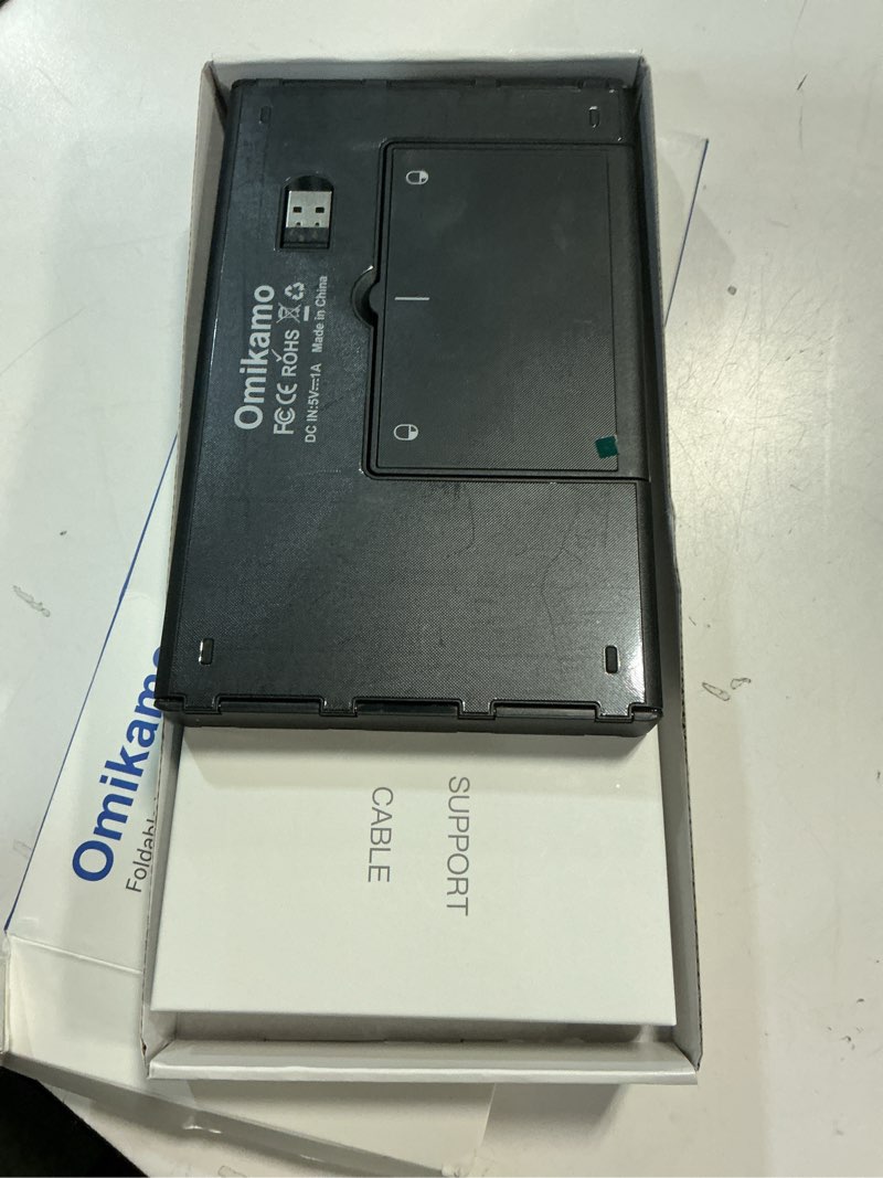 Condition photo showing Good Condition for foldable bluetooth keyboard with touchpad & number pad, 3 devices (2.4g+btx2) fold portable keyboard, full size key large trackpad wireless travel rechargeable keyboards for android windows ios tablet