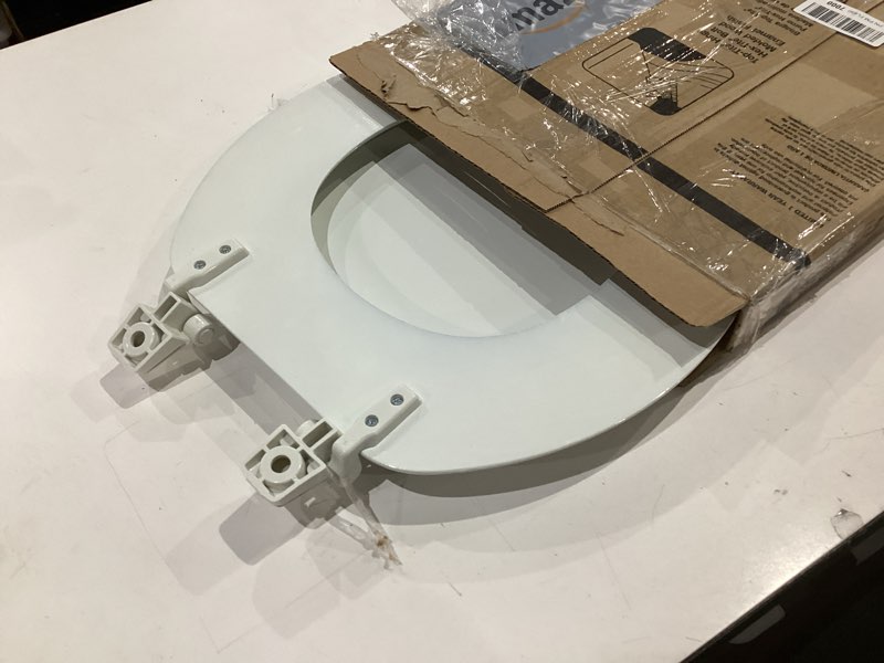 Condition photo showing As Is for round closed front toilet seat bathroom molded wood gloss white
