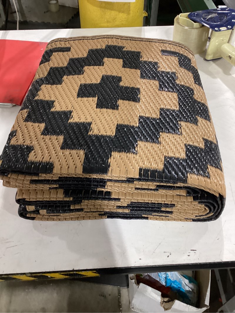 Condition photo showing Good Condition for sand mine reversible mats, plastic straw rug, modern area rug, large floor mat and rug for outdoors, rv, patio, backyard, deck, picnic, beach, trailer, camping, black & brown