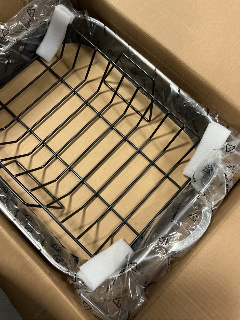 Condition photo showing New/Like New for COOKER KING Stainless Steel Nonstick Roasting Pan with Rack, 18.27x14.84 Inch Roaster Pan for 25 lb Turkey & Chicken, Oven Safe Up to 900°F, Compatible with All Cooktops (Rectangular, Large)