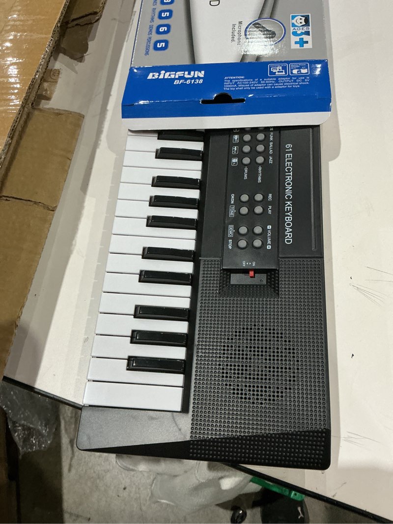 Condition photo showing Good Condition for m sanmersen kids music keyboard, 61-key portable electronic piano toy with microphone, teaching tool for beginners, ages 3-12, black 24.4*6.3*1.8 inch
