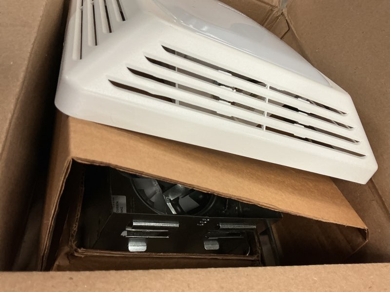 Condition photo showing As Is for air king 4-sone 70-cfm white