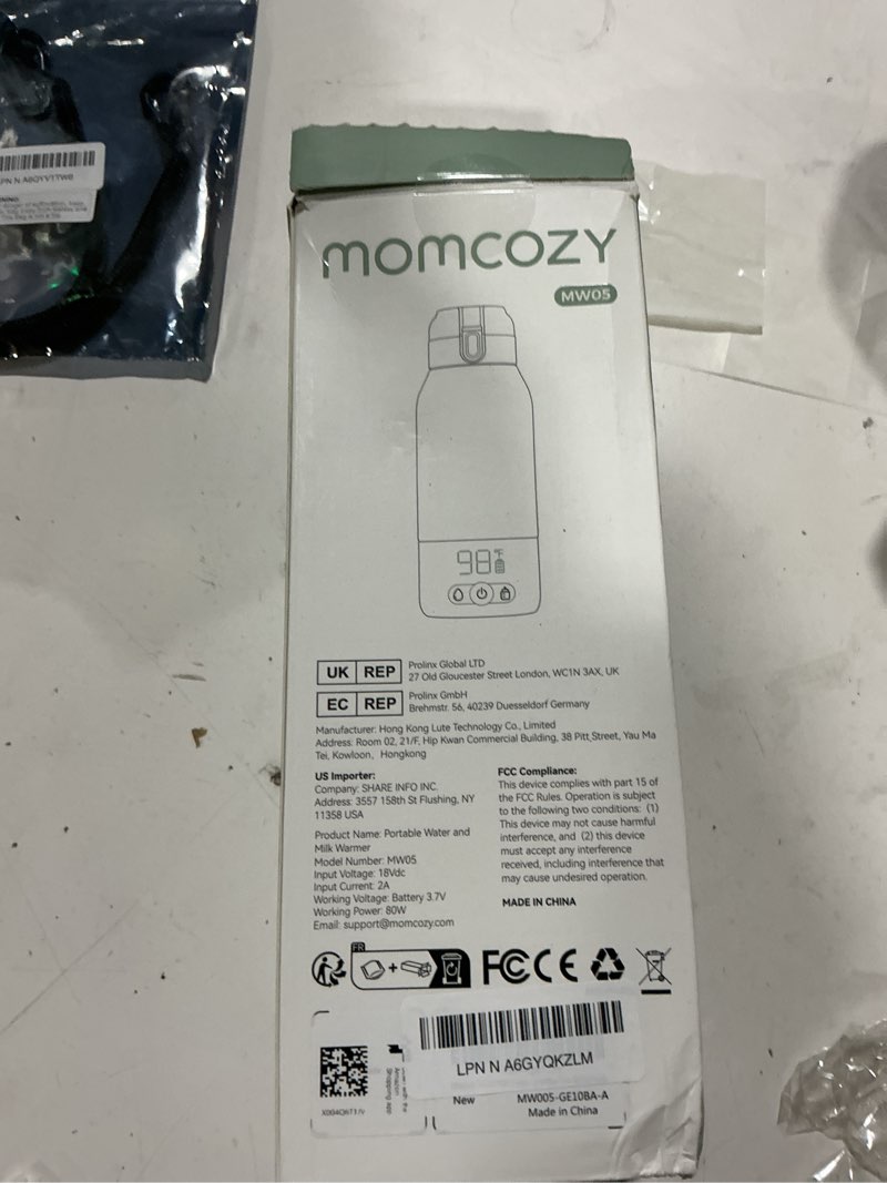 Condition photo showing Good Condition for Momcozy Portable Milk Warmer for Travel – Dual Heating Modes for Breast Milk & Water, Portable Bottle Warmer with Fast Heating & Long Battery Life, 17 Ounces Large Capacity to Meet Your All-Day Needs
