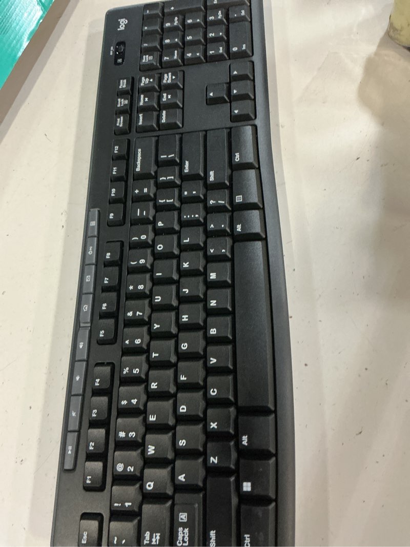 Condition photo showing As Is for (( missing mouse))logitech wireless keyboard and mouse