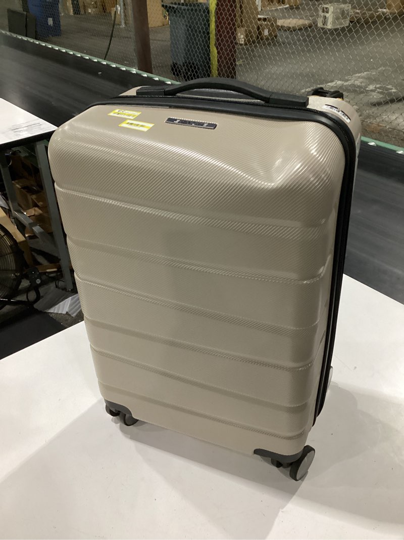 Condition photo showing As Is for skyline 8 wheel hardside spinner 20" carry on suitcase - oxford tan