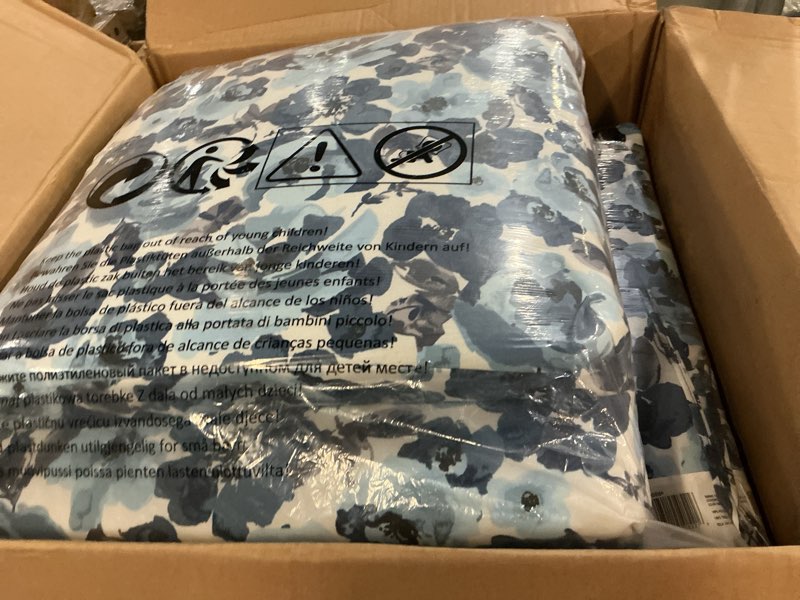 Condition photo showing Good Condition for arden 2-pack outdoor patio dining chair cushion, 20x44, rain-proof seat pad, fade-resistant outdoor cushion blue garden floral 2 pack blue garden floral