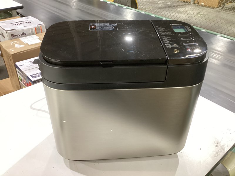 Condition photo showing Good Condition for panasonic bread machine, automatic bread maker with 20 presets and advanced temperature sensor for bread, cake, and pizza, gluten free baking, raisin nut dispenser - sd-r2550
