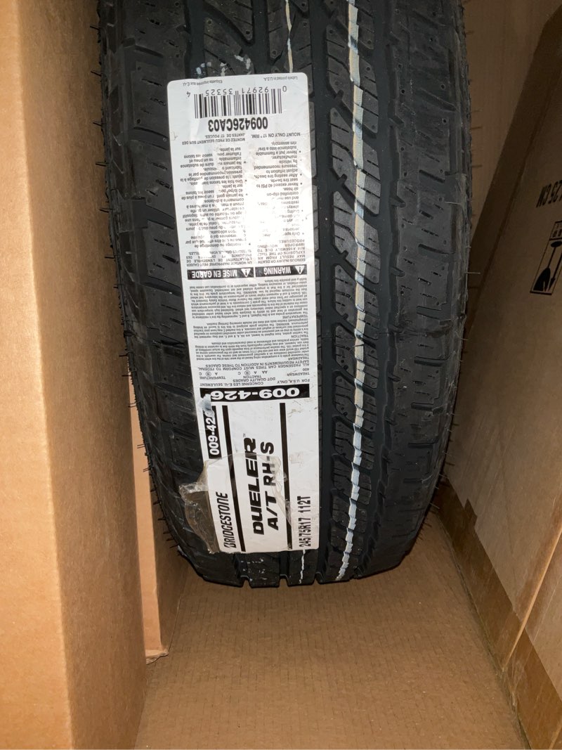 Condition photo showing As Is for Tire