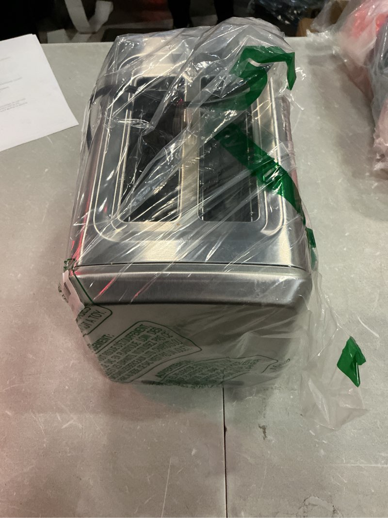 Condition photo showing Good Condition for hamilton beach 2 slice toaster with extra-wide slots, bagel setting, toast boost, slide-out crumb tray, auto-shutoff & cancel button, defrost function, stainless steel (22794) defrost function stainless steel toaster