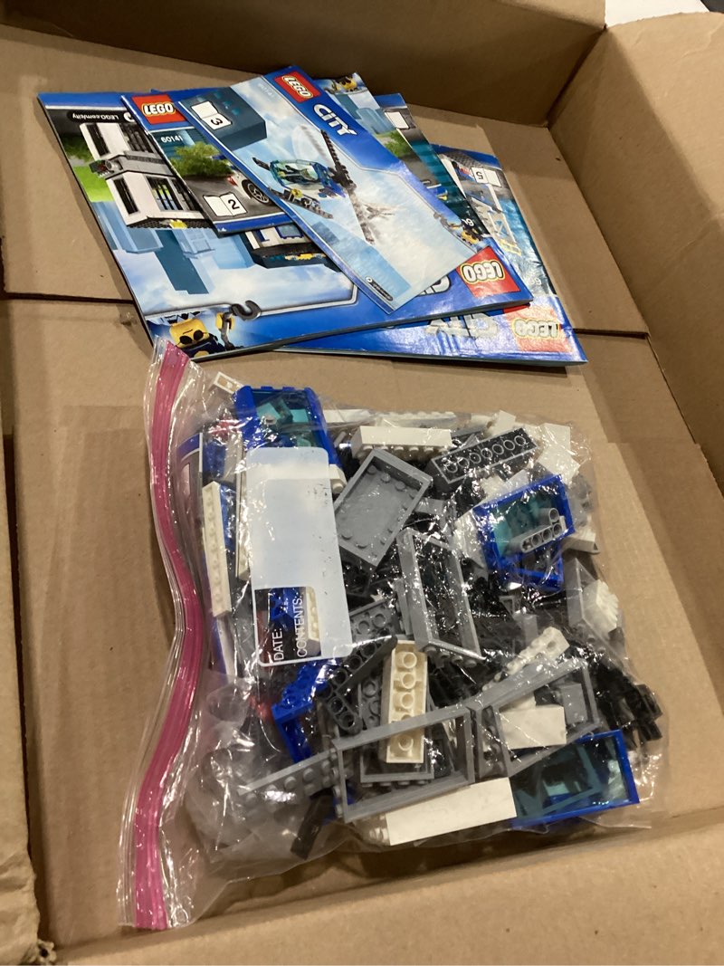 Condition photo showing As Is for LEGO City Police Station with Van, Garbage Truck & Helicopter Toy 60316, Gifts for 6 Plus Year Old Kids, Boys & Girls with 5 Minifigures and Dog Toy Standard Packaging
