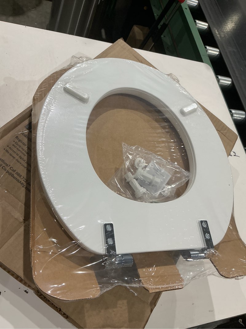 Condition photo showing New/Like New for mayfair padded toilet seat with chrome hinges, soft vinyl over wood core seat, made in usa, round, white elongated seat