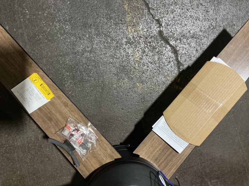 Condition photo showing As Is for 1k+ bought last week harbor breeze sunport easy2hang 52-in matte black with matte blades led covered outdoor