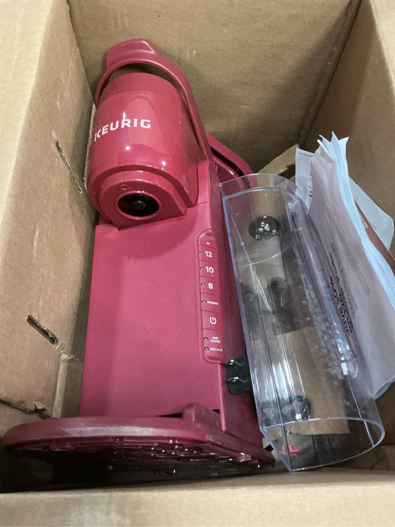 Condition photo showing As Is for keurig k-express single serve k-cup pod coffee maker, 3 brew sizes, strong button feature, 42oz removable reservoir, island berry