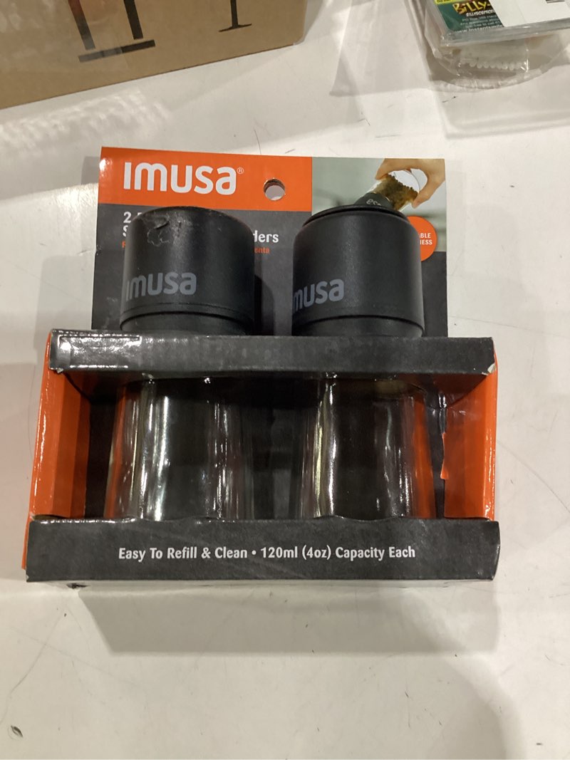 Condition photo showing As Is for imusa salt and pepper grinder set – 2-pack manual salt grinder & pepper mill with adjustable ceramic grinder for coarse to fine spices, 4oz, refillable glass base, easy-grip salt & pepper set black
