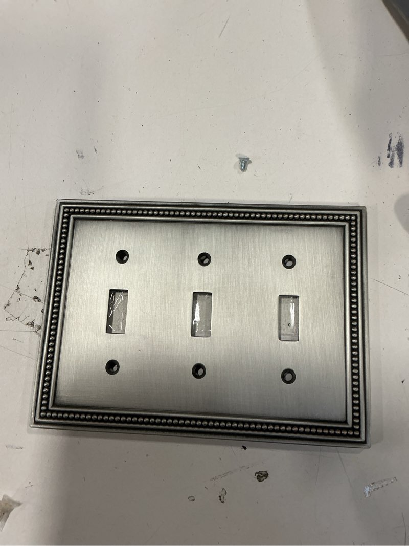 Condition photo showing Good Condition for AMERELLE 163TTTDB Traditional Steel Wallplate with 3, Aged, Triple Toggle, Oil Rubbed Bronze