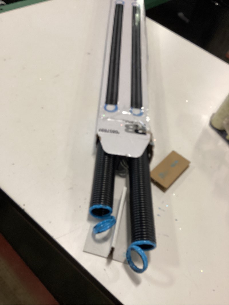 Condition photo showing As Is for RELIABILT 140 lbs Garage Door 140 Lb Garage Door Extension Springs- 2 PK Black Steel Extension