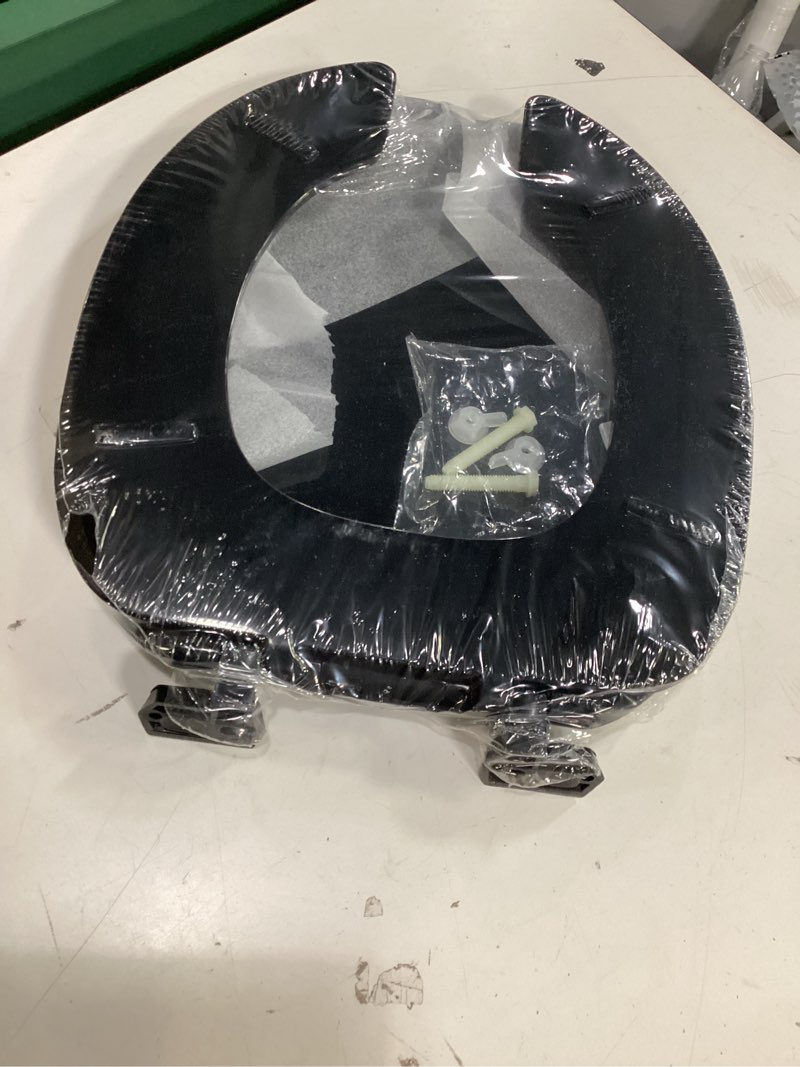 Condition photo showing Good Condition for centoco round plastic toilet seat, open front with cover, regular duty residential or light weight commercial use, black open front / made in the usa round black
