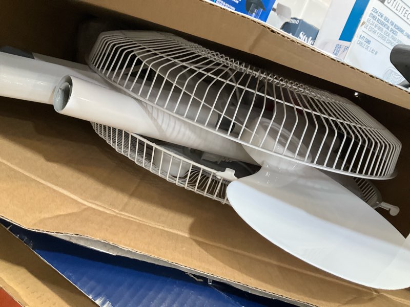 Condition photo showing As Is for utilitech 16-in indoor oscillating pedestal fan, in white