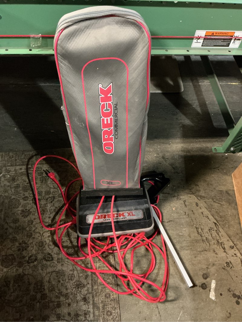 Condition photo showing As Is for Oreck Commercial U2000RB2L-1 LEED-Compliant Upright Vacuum,Gray/Black, 9.25"D x 47.75"H x 12.5"W