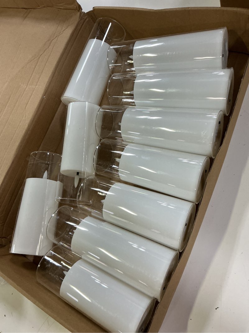 Condition photo showing Good Condition for kakoya flickering flameless candles battery operated with remote and 2/4/6/8 h timer acrylic led pillar candles pack of 10 (appr d2.3\"xh5.5\"6.5\"7.5\")with realistic 3d wick candles for home decor(white) white-1
