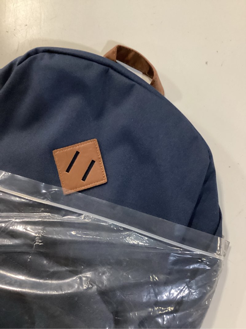 Condition photo showing New/Like New for heritage canvas backpack - navy