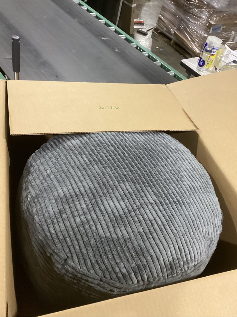 Condition photo showing As Is for HIGOGOGO Round Stuffed Pouf Ottoman, Corduroy Poufs with Foam Chunk Filling, Furry and Fluffy Pouf Foot Stool Storage Ottoman, 20 X 15 Floor Poufs Foot Rest for Living Room, Dark Grey 20 inch Dark Grey