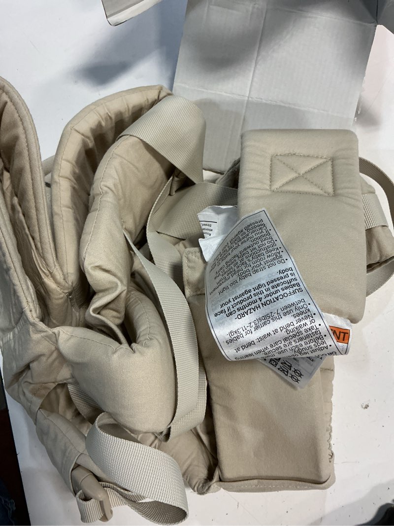 Condition photo showing Good Condition for momcozy newborn carrier weesnug- lightweight and cozy comfort for 7-25 lbs, ergonomic cross-back support, effortless to put on, hands-free baby carrier with lumbar support, khaki