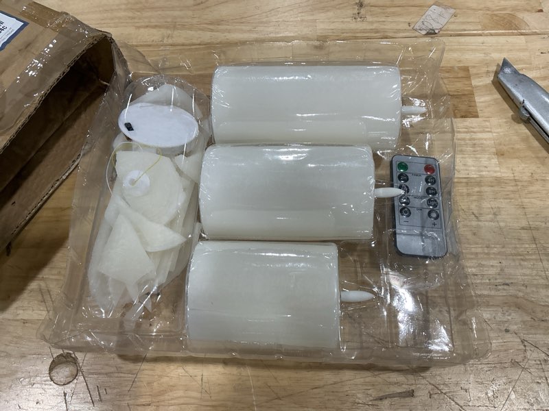 Condition photo showing As Is for lusharbor flameless candles, 4 pack battery operated candles with remote, real wax led fake candles with timer flickering for christmas wedding home party d3 h 5" 6" 7" 9" white
