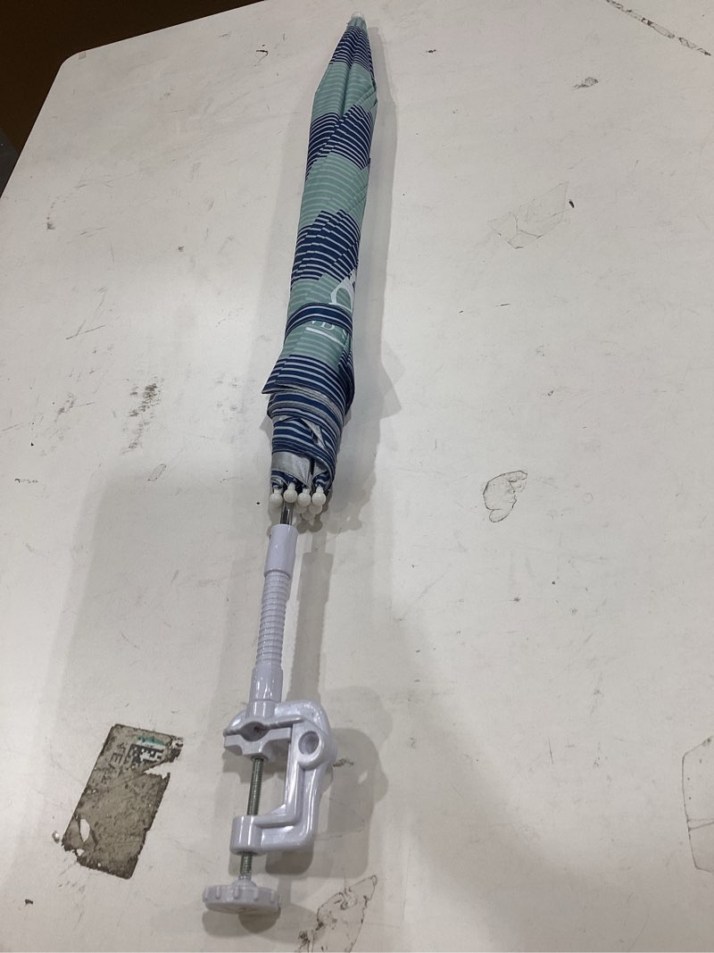 Condition photo showing As Is for portable umbrella