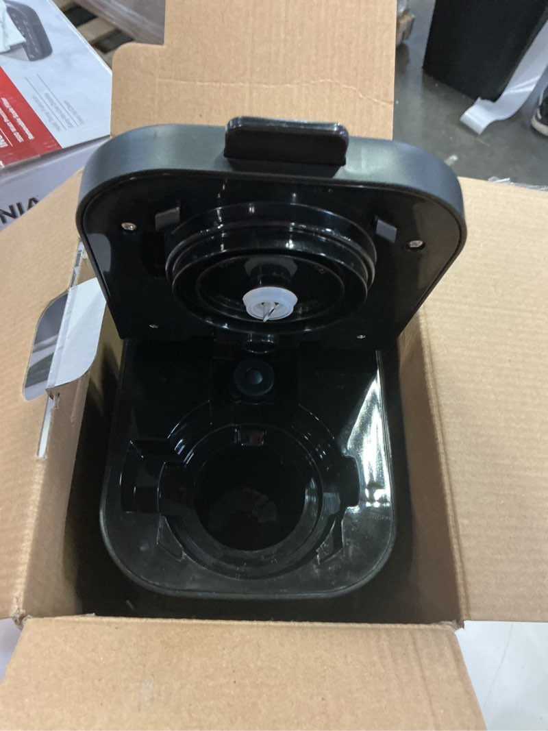 Condition photo showing As Is for mainstays black matte single serve coffee maker