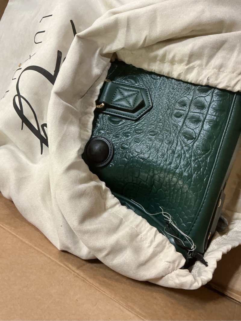 Condition photo showing Good Condition for Tote&Carry Apollo 2 Large Rolling Duffle Bag with Wheels, Carry-On Roll Duffel for Travel, Gym, Sports, Daily, Weekend & All-Purpose Use for Men & Women (Crocodile Skin, Emerald Green) Emerald Green Crocodile Skin Pattern