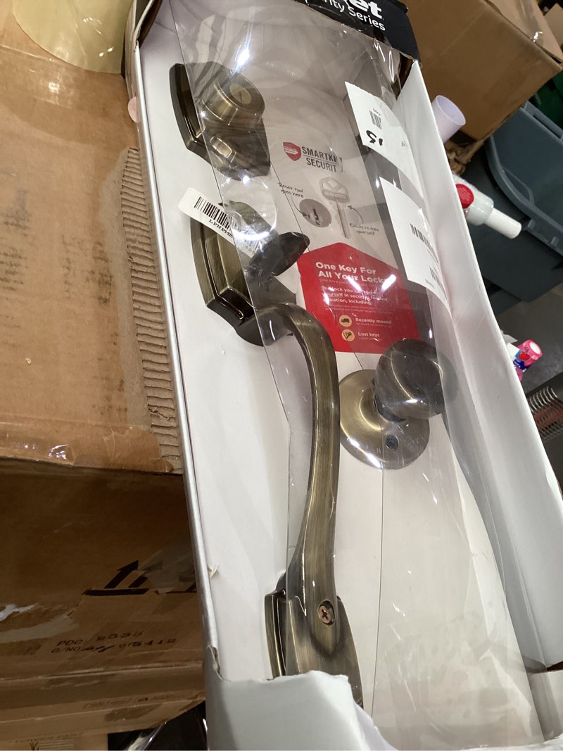 Condition photo showing As Is for Kwikset Belleview Front Door Lock Handle and Deadbolt Set, Entry Handleset Exterior with Interior Door Knob, Antique Brass, Pick Resistant SmartKey Rekey Deadbolt Security An tique Brass Full Handleset