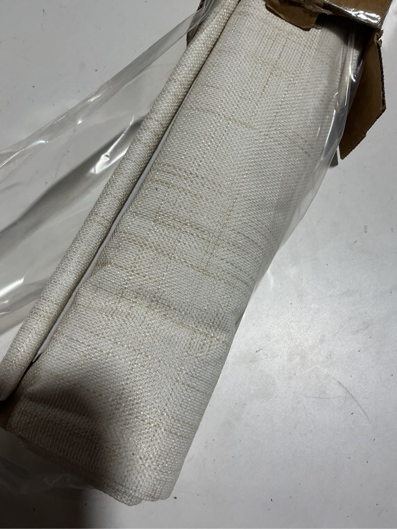 Condition photo showing As Is for sun zero seraphina textured 100% total blackout cordless roman shade, linen, 31" w x 64" h