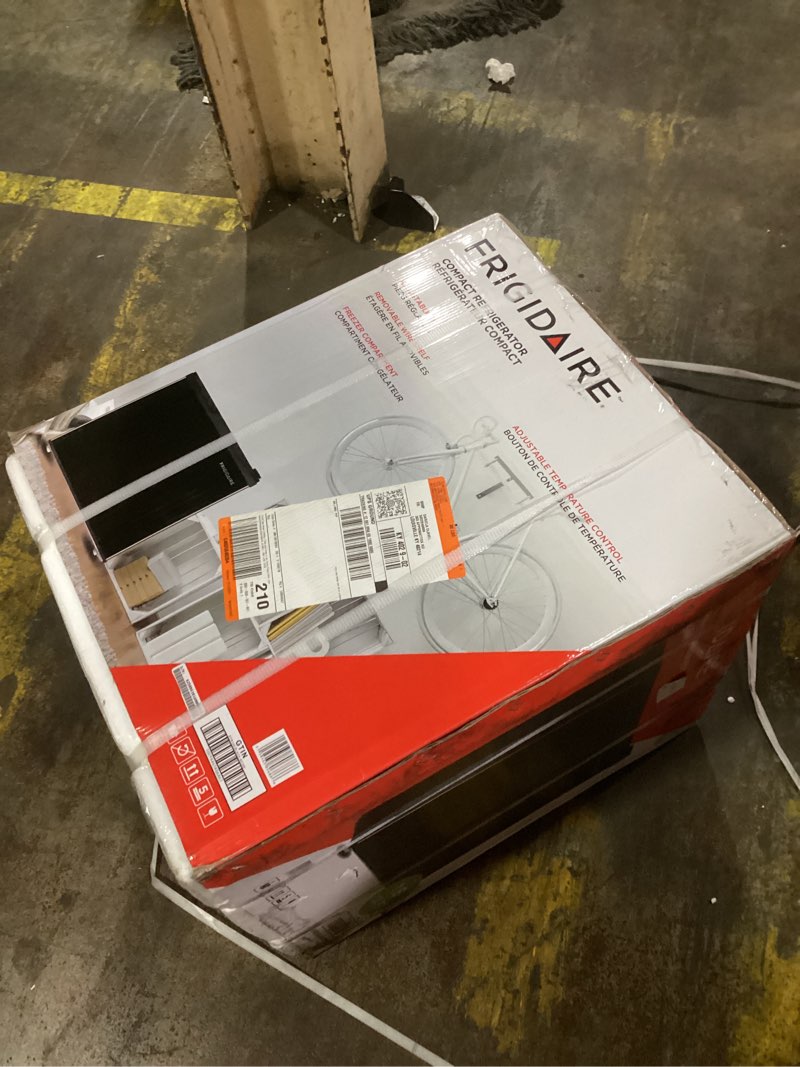 Condition photo showing Good Condition for FRIGIDAIRE Black Retro Mini Refrigerator-Energy Saving-Adjustable Thermostat Control-Side Mounted Bottle Opener-Ideal for Dorm, Office, RV, Garage, Apartment 1.6 Cubic Feet