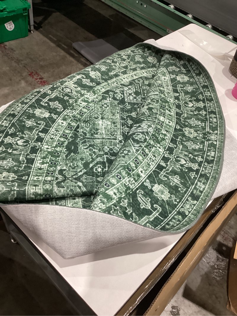 Condition photo showing As Is for rugs indoor round(we dont know the side)