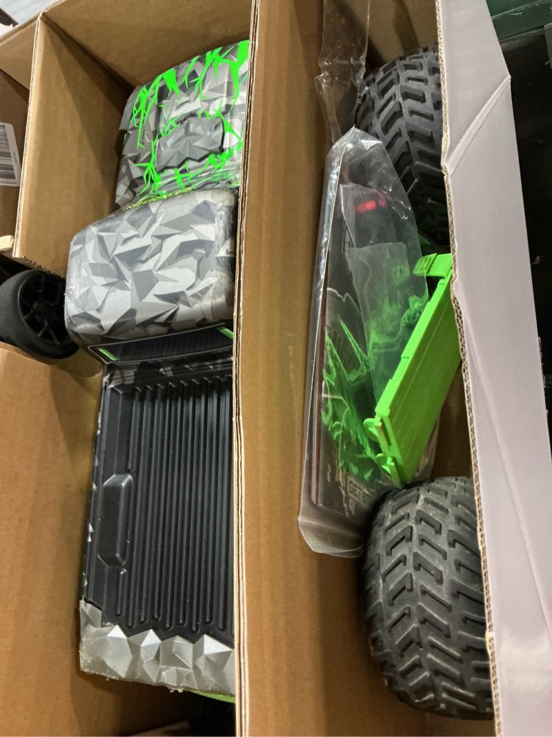 Condition photo showing As Is for arrma rc truck 1/10 quake 223s 2wd rtr (battery and charger not included) brushless monster truck, red, ara3537t1