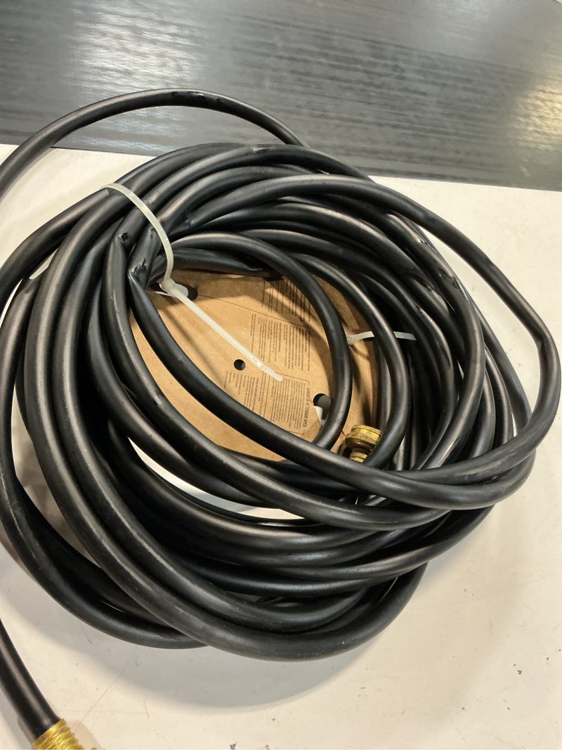 Condition photo showing As Is for teknor apex soil soaker 3/8-in x 50-ft vinyl black coiled hose