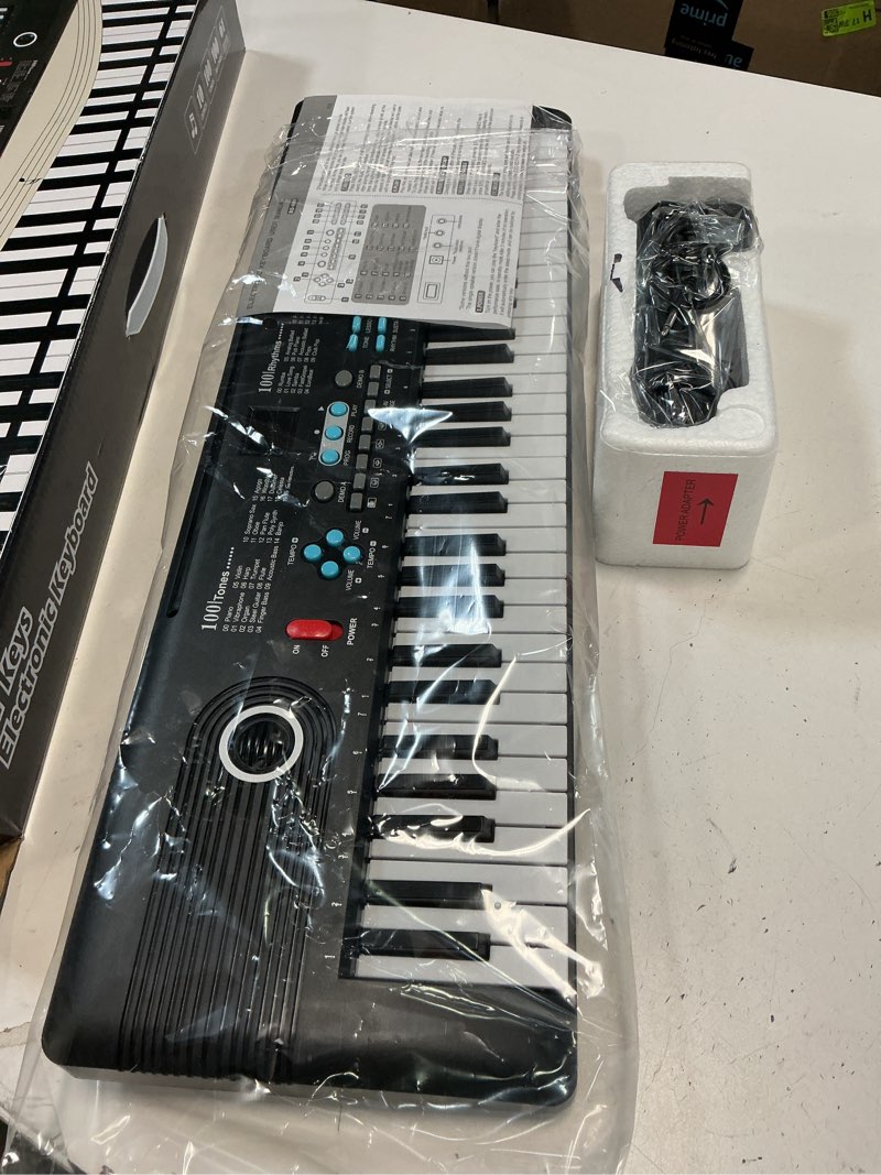 Condition photo showing Good Condition for 61 key keyboard Piano, Portable Electronic Digital Piano, Built In Dual Speakers, External Microphone, Power Plug, Rich Teaching Content, Multi-Functional Electronic Piano Suitable For Beginners