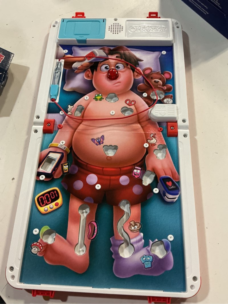 Condition photo showing As Is for hasbro gaming operation board game - multi - no size