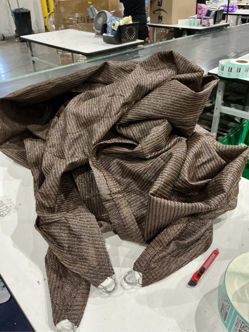 Condition photo showing As Is for brown rectangle sun shade sail for backyard deck outdoor