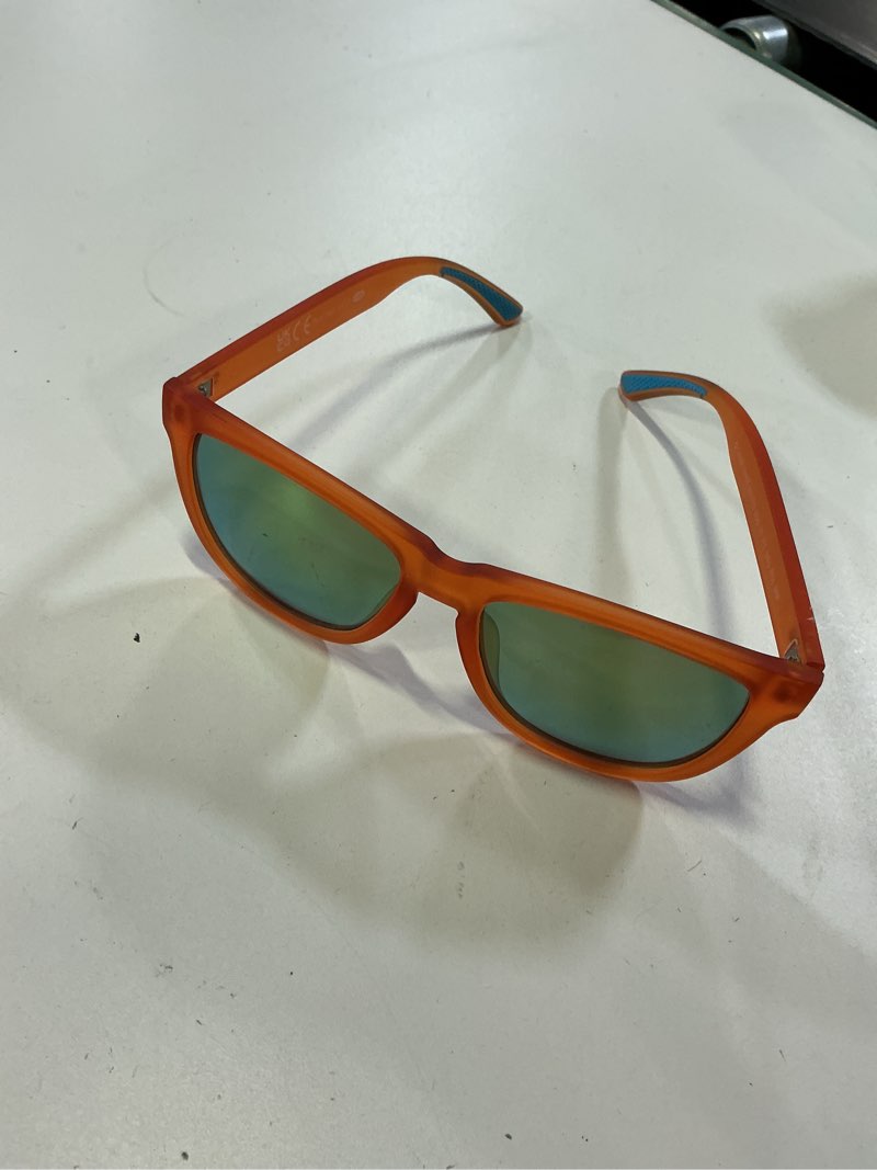 Condition photo showing New/Like New for polarized sunglasses tangerine unisex