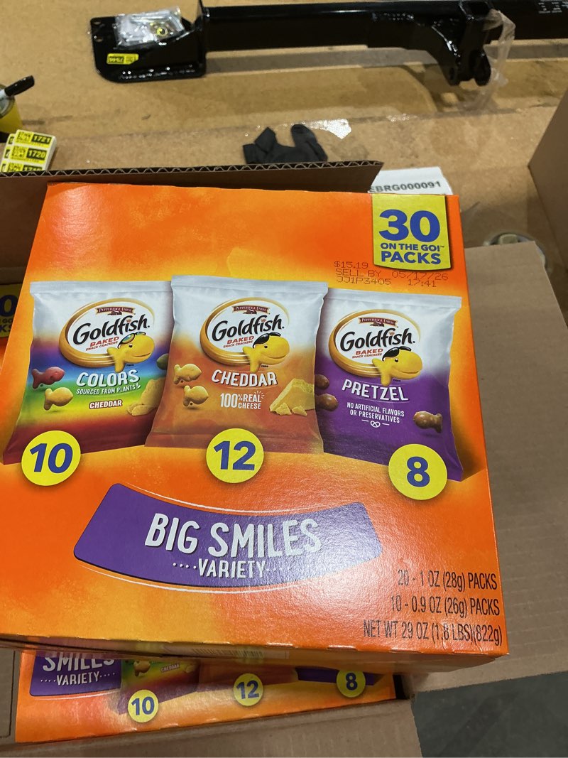 Condition photo showing New/Like New for sell by 5/17/26 goldfish crackers big smiles variety pack with cheddar, colors, and pretzels, snack packs, 30 ct pack of 4