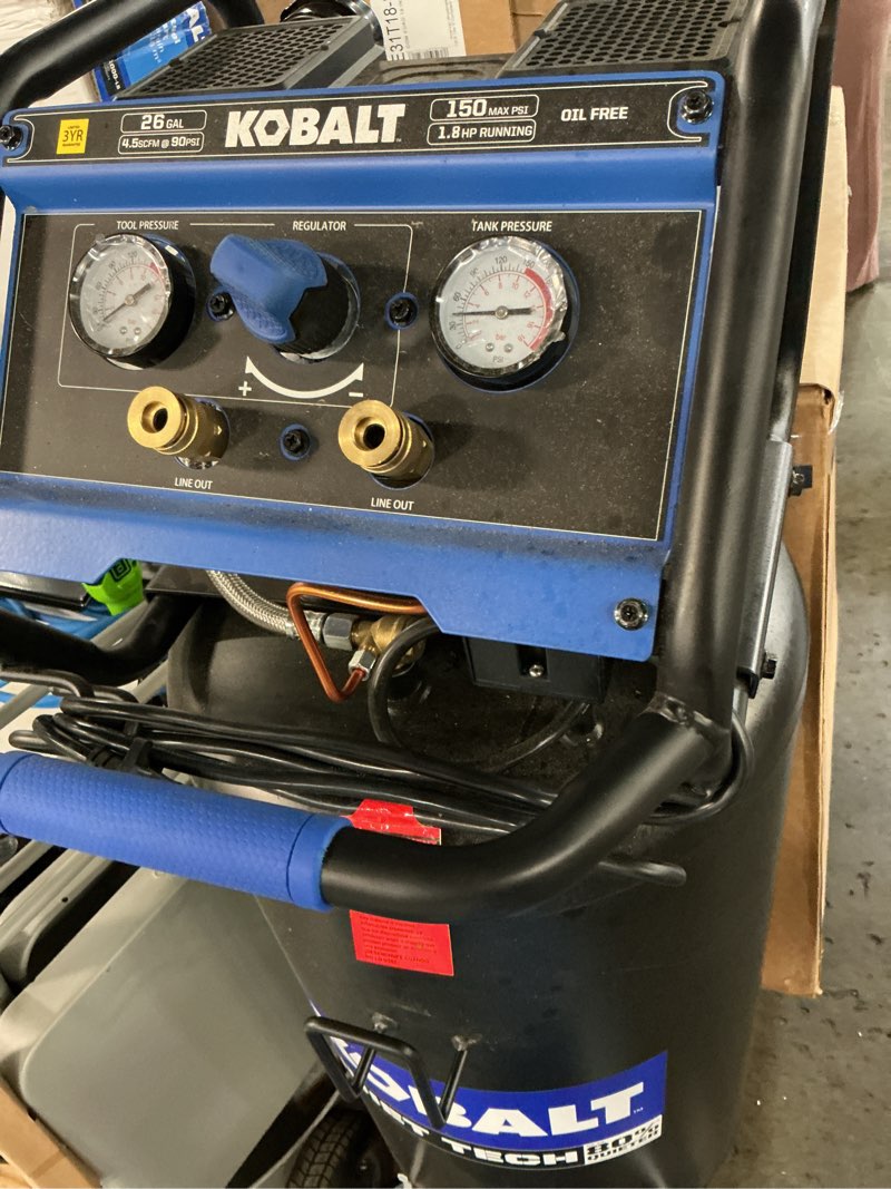 Condition photo showing As Is for kobalt quiet tech 26-gallon portable electric 150 psi vertical air compressor