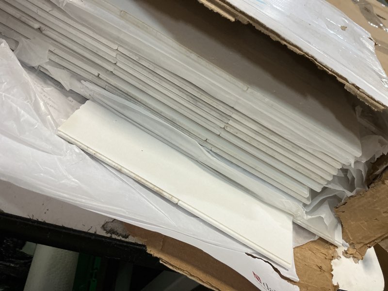 Condition photo showing As Is for daltile simplystick mosaix 2" x 4" marble natural stone peel and stick bevel mosaic in daphne white for walls and backsplashes | (12 pc per carton) (11.64 sqft per carton)