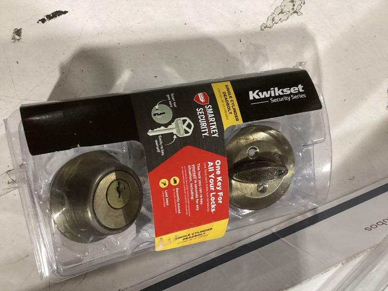 Condition photo showing As Is for kwikset security 660 series satin nickel single cylinder deadbolt ft. smartkey security