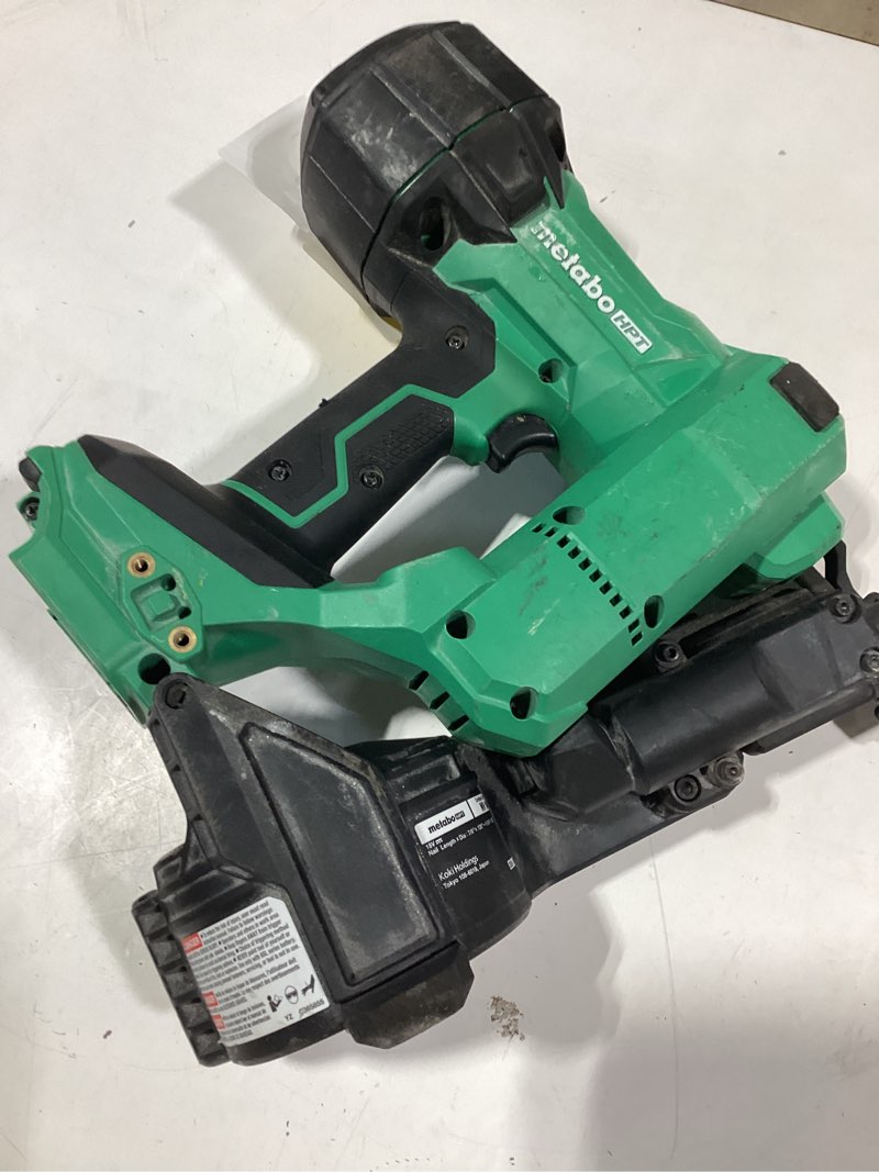 Condition photo showing As Is for metabo hpt nail gun used, no bag, just the gun