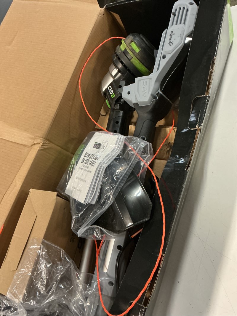 Condition photo showing As Is for ego power+ powerload st1511t 15 in. 56 v battery string trimmer kit (battery & charger) w/ telescopic shaft & 2.5 ah battery