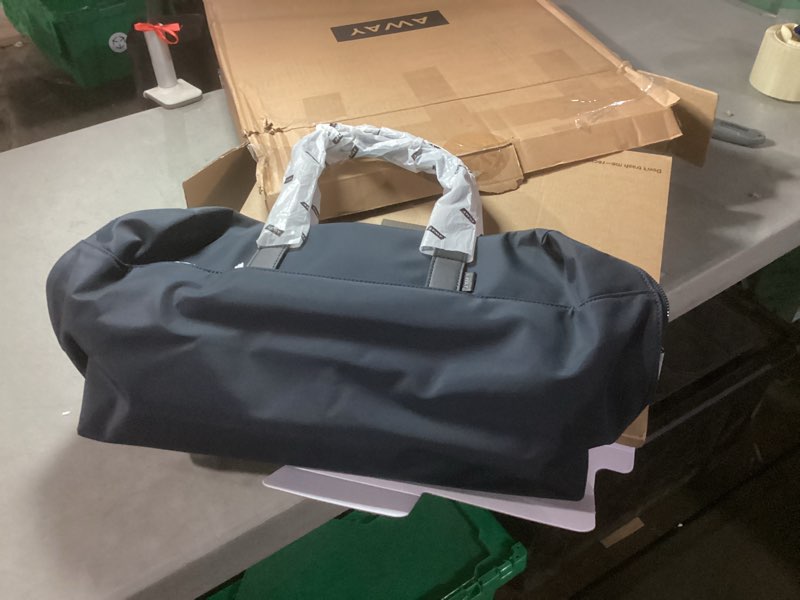 Condition photo showing Good Condition for away everywhere duffle bag, water repellent travel bag, padded laptop sleeve, gym & weekender bag, large duffle for travel, navy blue