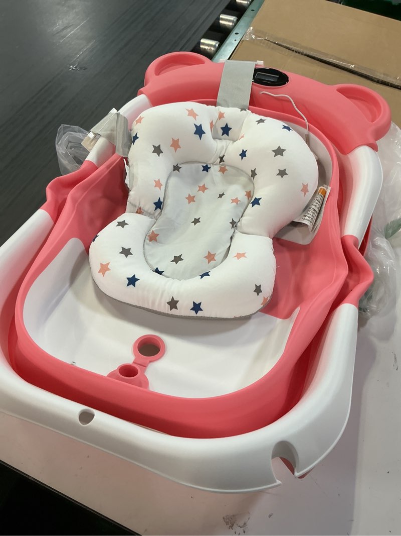 Condition photo showing As Is for tpn collapsible baby bathtub, baby bath tub with soft cushion & real-time thermometer, baby bathtub infant to toddler tub (0-36 months), portable newborn travel bath tub bear shape pink