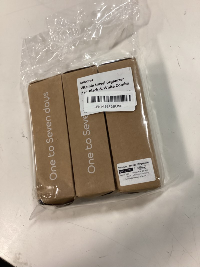 Condition photo showing New/Like New for Ankomn 7 Day 2+1 Travel Pill Organizer Combo for Men & Women - IPX7 Rating Waterproof, Airtight & Portable Pill Case for Vitamins - Durable Weekly Supplement Case with Stackable Compartments 2+1 Black & White Combo